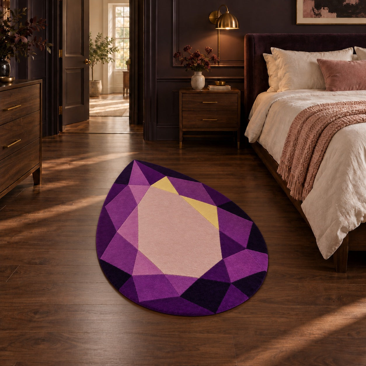 Amethyst Drop Gem Rug on the floor at the foot of a bed in a warm neutral bedroom