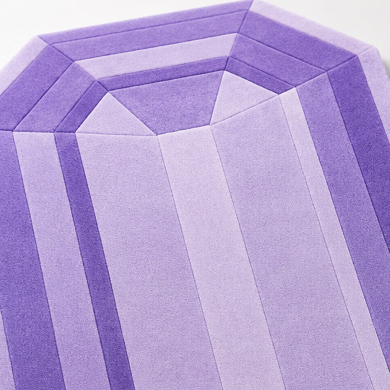 Close-up of the faceted lilac tones on the Amethyst Lilac Emerald Gem Rug