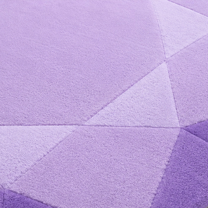 Detail of the faceted lilac wool pile on the Amethyst Lilac Round Gem Rug