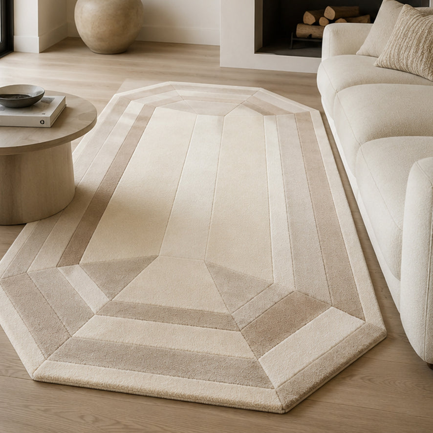 Beige Emerald Gem Rug styled beside a fireplace in a cream living room