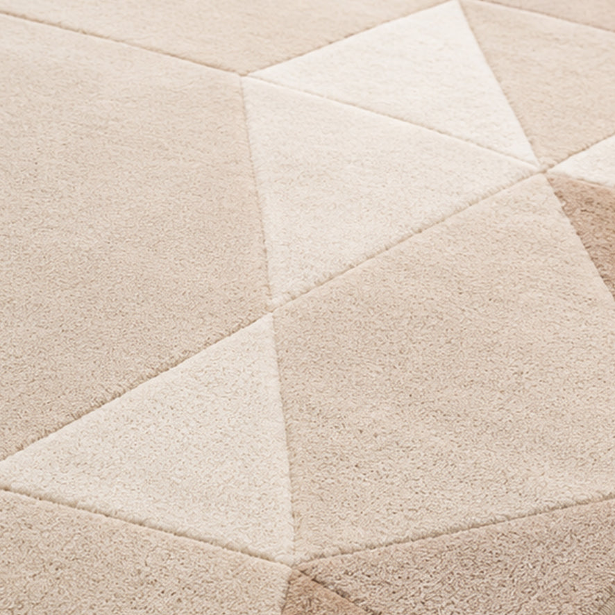 Detail of the neutral faceted wool pile on the Beige Round Gem Rug