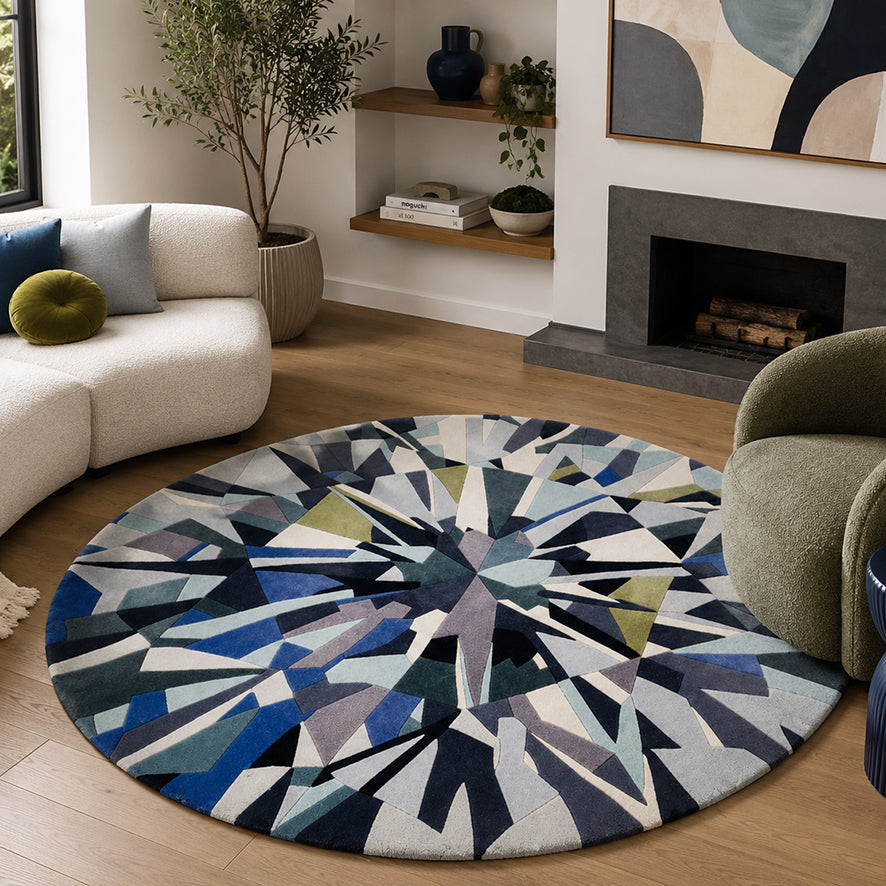 Blue Diamond Round Gem Rug styled in a living room with a fireplace and cream sofa
