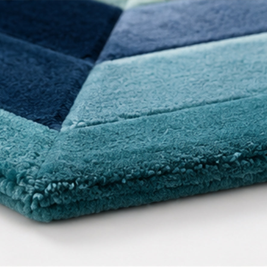 Close-up of the carved edge and one-inch wool pile on the Blue Emerald Gem Rug