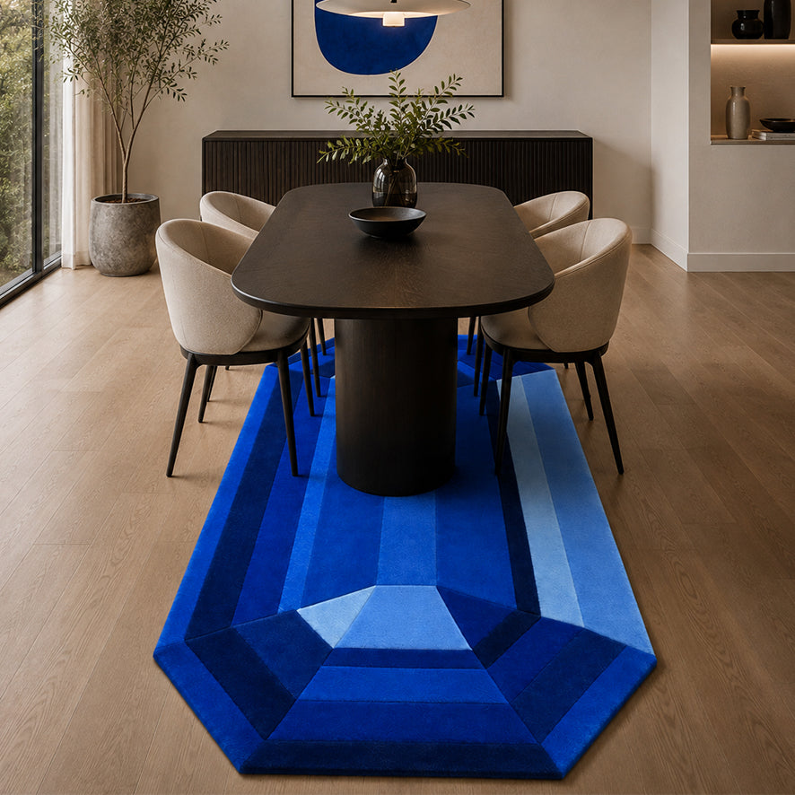 Blue Sapphire Emerald Gem Rug styled under a black dining table