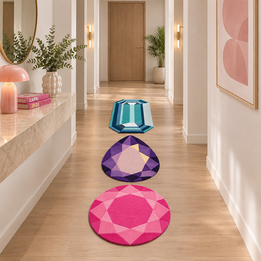 The Mini Gem Rug Bundle of three mini gem rugs styled in a hallway