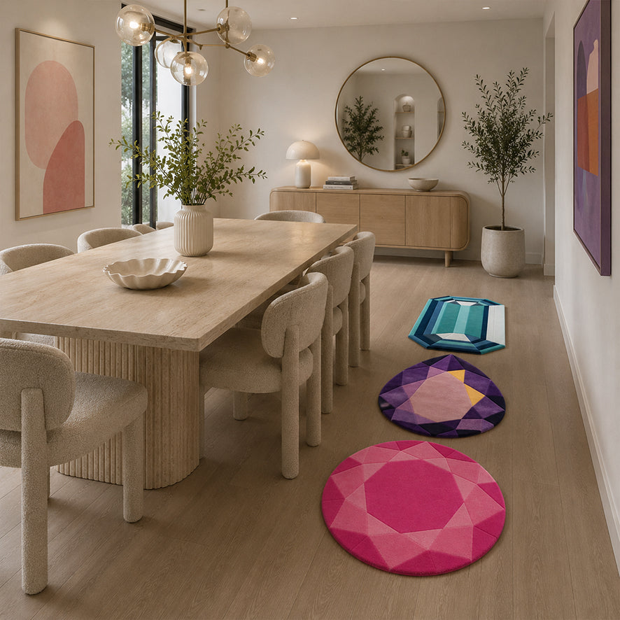 The Mini Gem Rug Bundle of three mini gem rugs styled under a dining table