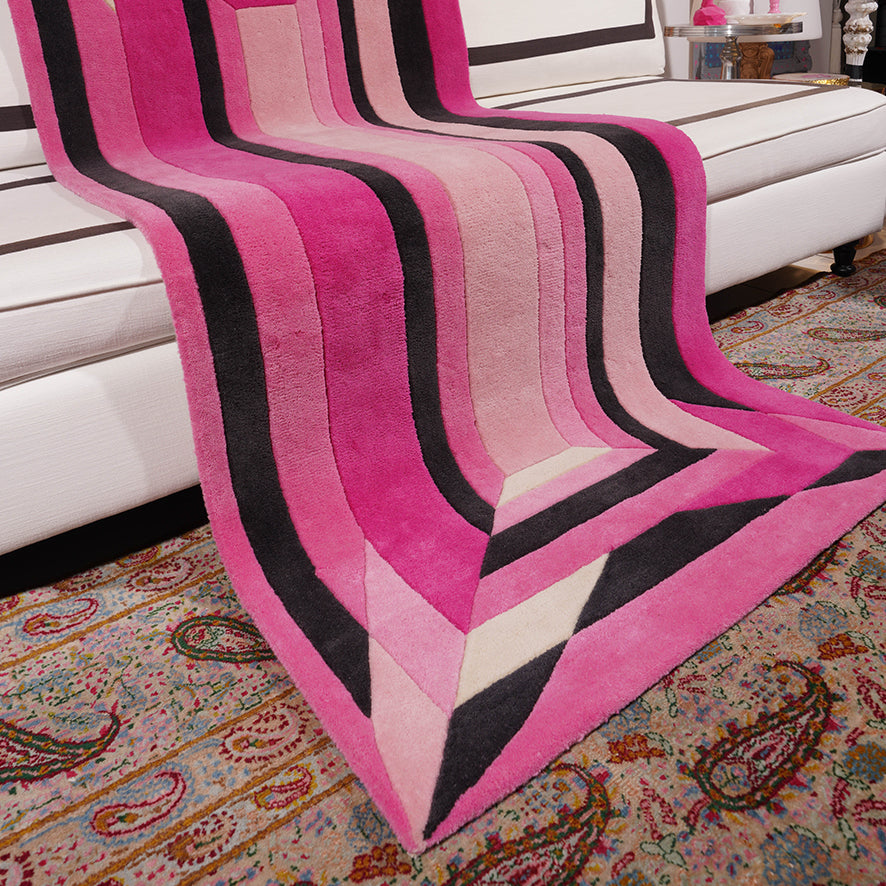 Miri Baguette Gem Rug runner styled beside a white sofa over a patterned carpet