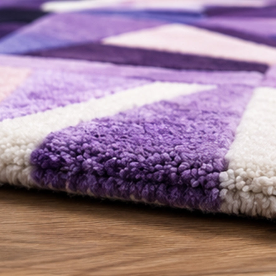 Detail of the faceted wool pile and edge on the Purple Diamond Round Gem Rug