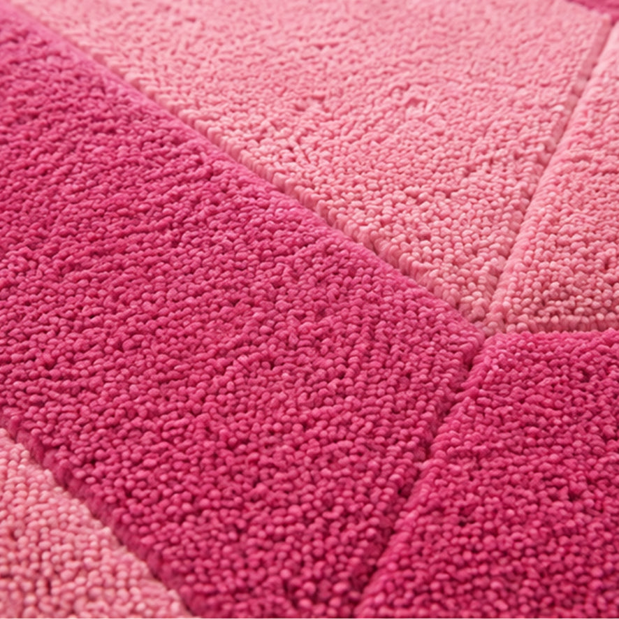 Detail of the blush and rose facets on the Rose Quartz Emerald Gem Rug