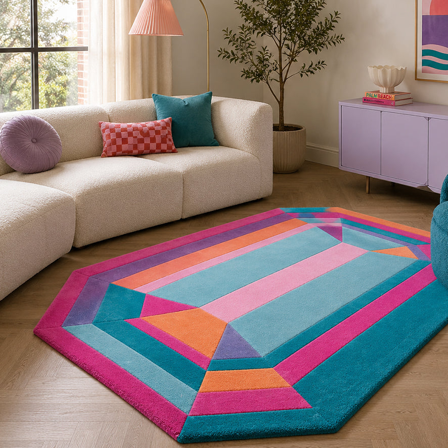 Sydney Emerald Gem Rug styled in a living room with a cream sofa